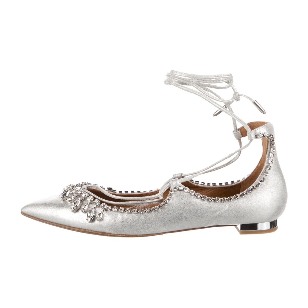 Aquazzura closed toe flat sandals with Swarovski crystal jewel detail.